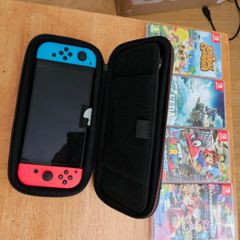 Nintendo Switch Oled + Games + Case