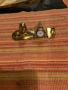 Pyramid pen holder and clock