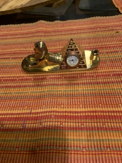 Pyramid pen holder and clock