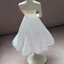 Vintage "The Latest Thing" Figurine Image 3