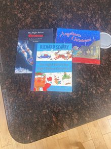 Three Christmas themed books. Excellent condition.
