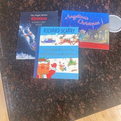Three Christmas themed books. Excellent condition.