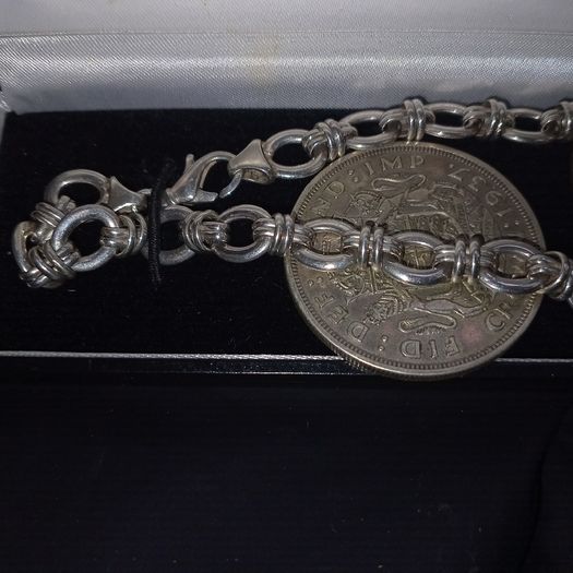 Silver Link Chain and some coins.