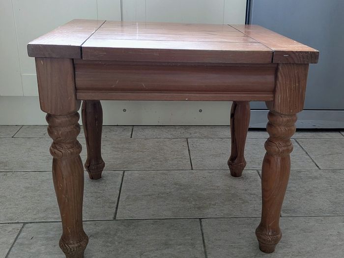 A small wooden side table
