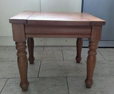 A small wooden side table