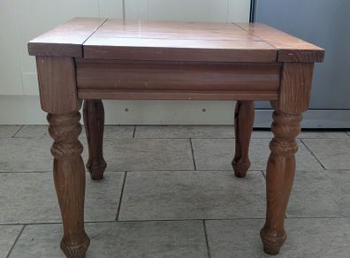 A small wooden side table