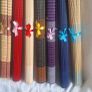 Ten Multicoloured woven bamboo placemats. Image 5