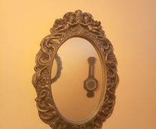 Vintage oval mirrors pair