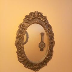 Vintage oval mirrors pair