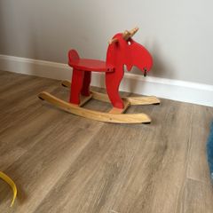 Kids wooden rocking horse