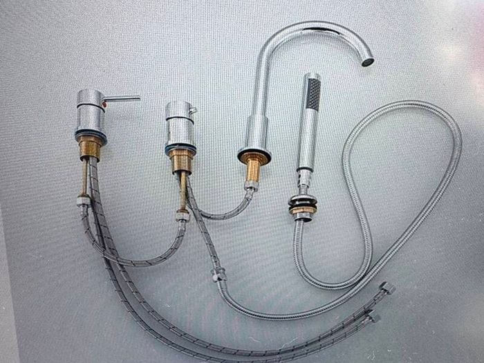Bath mixer tap with shower attachment. Brass gold. Deck mounting 4 holes.