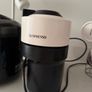 Nespresso Vertuo Coffee Machine with pods storage and leftover pods Image 2