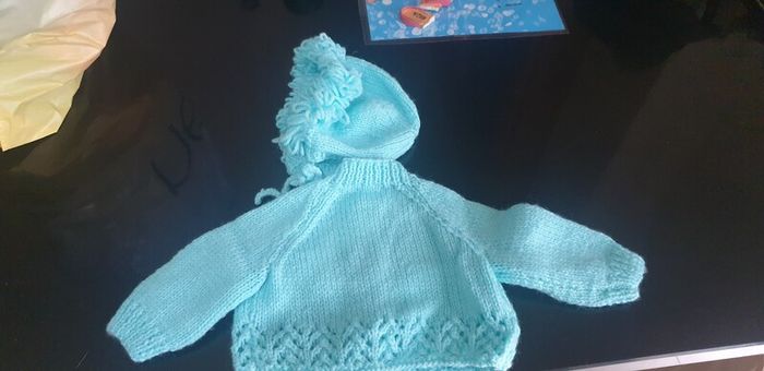 Hand knit baby cardigan and bonnet