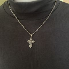 Silver tone chain necklace with rhinestone cross