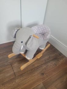 Rocking baby elephant