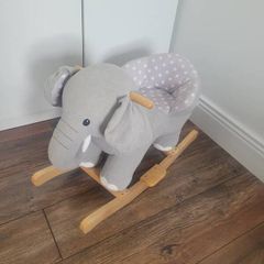 Rocking baby elephant