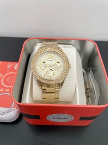Fossil Multi-Function Women's Quartz Analog Crystals Champage Dial Stella Yellow gold toned steel round dress casual watch 38 mm 50M water resistance