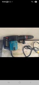Makita 110V heavy SDS-Max rotary/demolition hammer, with auxiliary handle and yellow site plug