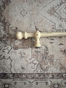 Antique cream curtain pole