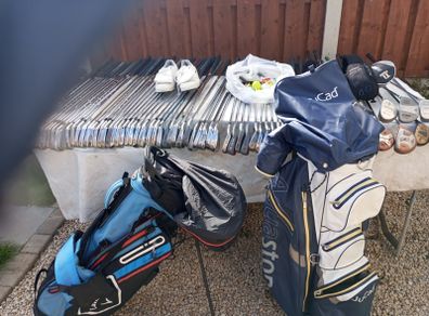 A selection of golf clubs and bags. All right handed clubs.