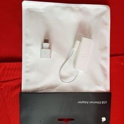 Apple USB Ethernet Adapter A1277 (Brand new in a sealed bag).