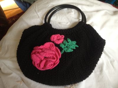 Handmade crochet bags hats and other items