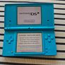 Nintendo DSi handheld console With Super Mario Bros Image 3