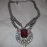 a lovely vintage  costome jewelley pendent with white stones and a large red stone Image 3
