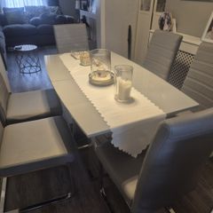 Modern high gloss dining table & chairs.