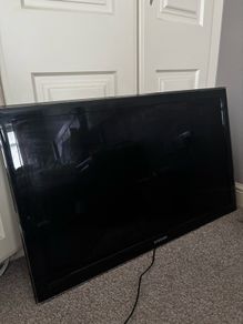 wall mounted Samsung 40" LED TV