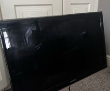wall mounted Samsung 40" LED TV
