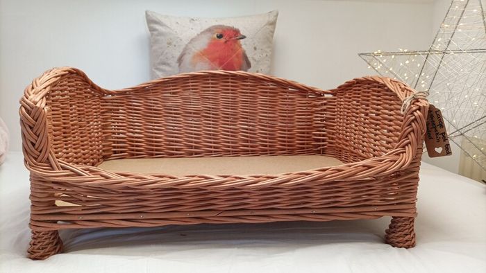 cat bed, dog bed, wicker basket with sheepskin rug included