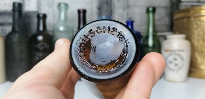 82 - Vintage Kruschen Salts Dark Brown Glass Bottom Embossed Bottle