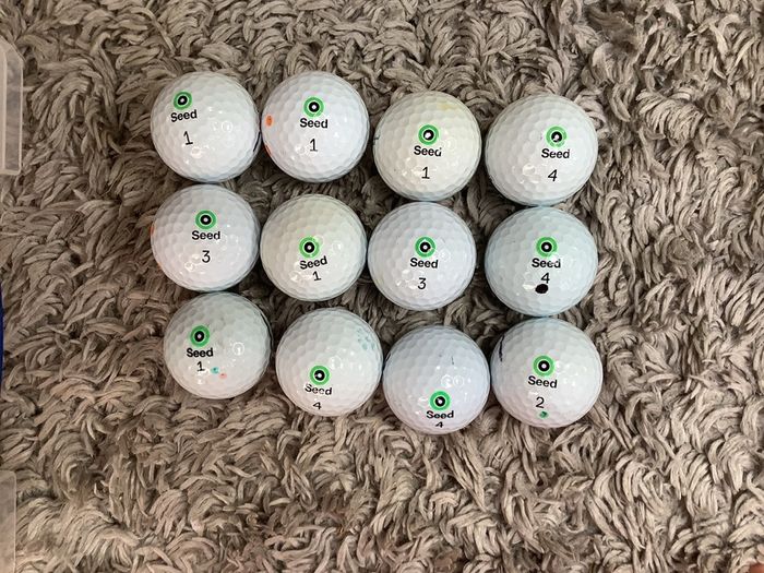 Seed golf balls per dozen  (4 dozen available)