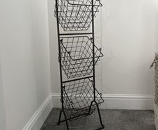 Hanging storage baskets