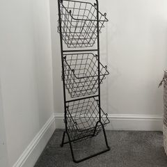 Hanging storage baskets