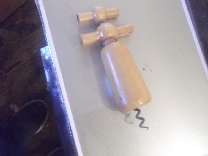 a vintage wooden  cork screew working