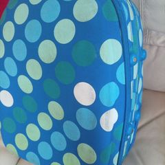 Blue dotted suitcase