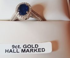 9 ct White Gold & Sapphire ring,size O. Cubic Zirconia
