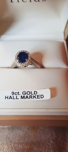 9 ct White Gold & Sapphire ring,size O. Cubic Zirconia