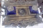 a solid antique brass ink stand with bristol blue ink holders
