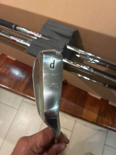 Taylormade Qi Irons 5 to SW regular flex still in the box 9 iron and 5 iron hit once wrappers still on irons