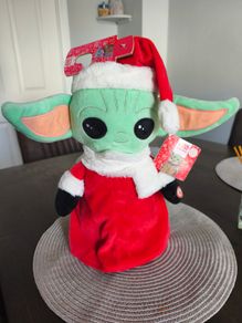 Baby Yoda toy brand new moves and makes sounds