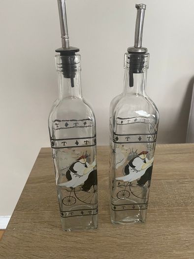 Reduced Set of tall oil and vinegar bottles in stand