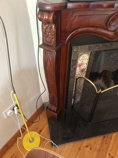 Ornate mahogany fire surround/mantle