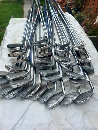 A selection of golf clubs and bags. NOT SELLING SEPARATE