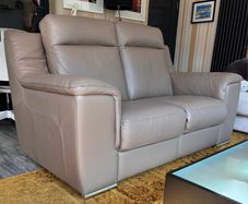 Italian leather two seater (recliner)