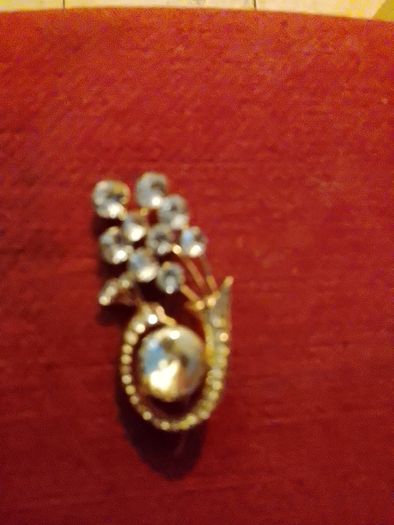 Gold plated brooches