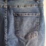 Mid-wash Distressed Jeans with Cuffed Hem. Image 5