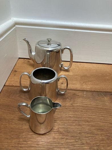 Silver teapot /Sugar bowl /milk jug and cake slice